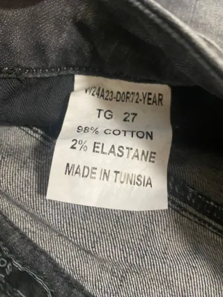 Jeans grigi con toppe