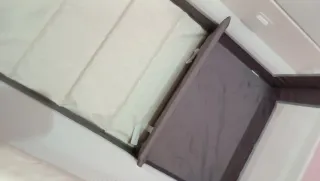 Cuna de viaje y colchón