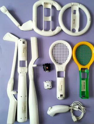 Accesorios Wii: volante, raqueta, bate, adaptador