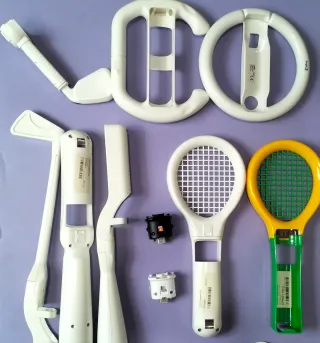 Accesorios Wii: volante, raqueta, bate, adaptador