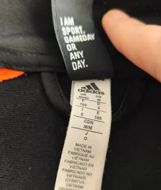 Chaqueta Adidas Negra y Naranja