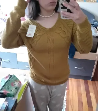 Jersey mostaza con trenzas