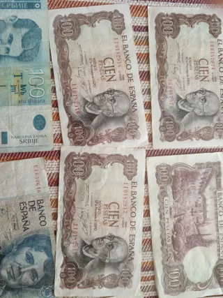 33 Billetes  100, 500, 5 pesetas y extrajeros