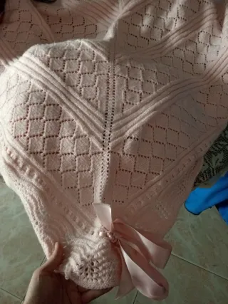 Toca de bebé rosa con lazo