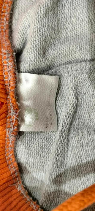 Pantaloni tuta grigi con laccetti arancioni