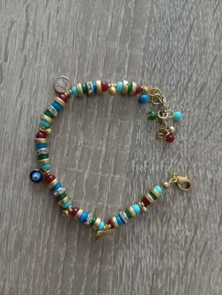 Pulsera multicolor con dijes y ojo turco