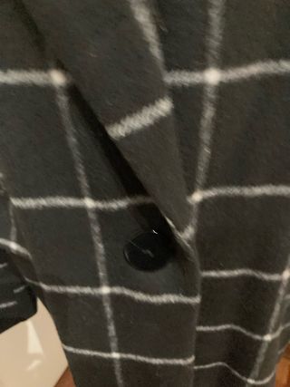 Cappotto a quadri nero e bianco