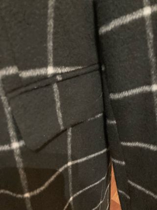 Cappotto a quadri nero e bianco