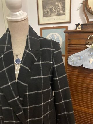 Cappotto a quadri nero e bianco