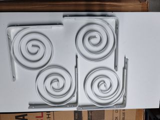 Soportes metálicos para baldas con diseño espiral