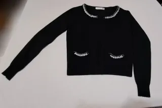 Giacchetta nera con dettagli S/M