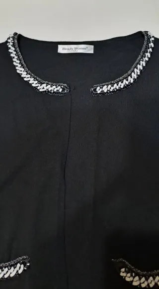 Giacchetta nera con dettagli S/M