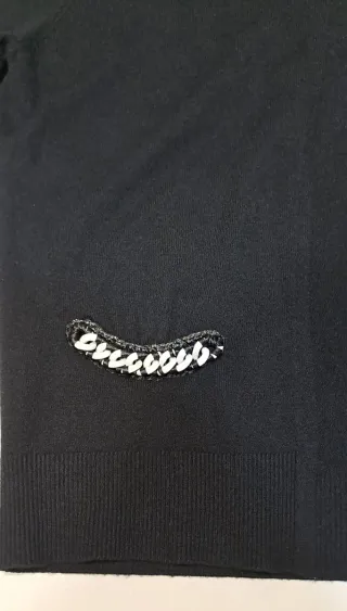 Giacchetta nera con dettagli S/M