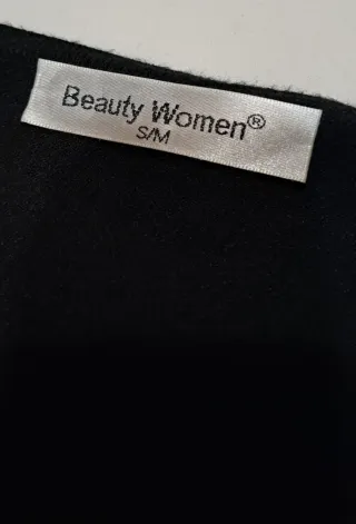 Giacchetta nera con dettagli S/M