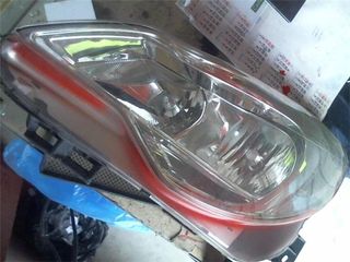 FARO DEL. IZDO. OPEL CORSA D (2006->) 1.7 CDTI