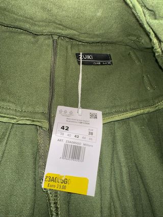 Gonna verde plissettata con fibbie