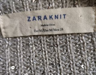 Jersey ZARA  gris con pocas lentejuelas.