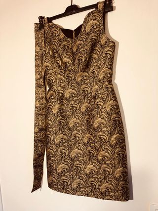 Abito oro e nero con fantasia