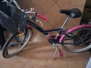 Bicicleta BTWIN azul y rosa casi nueva