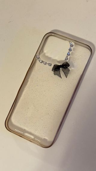 Cover Iphone 15 ProMax glitter con fiocco e strass