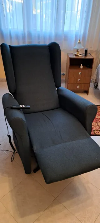 Poltrona relax in tessuto, usata poco