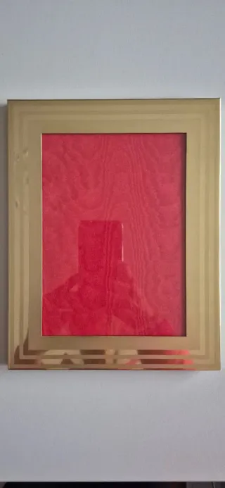 Cornice in metallo dorato dim. interna 12x17