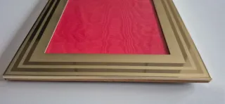 Cornice in metallo dorato dim. interna 12x17