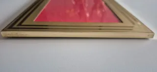 Cornice in metallo dorato dim. interna 12x17