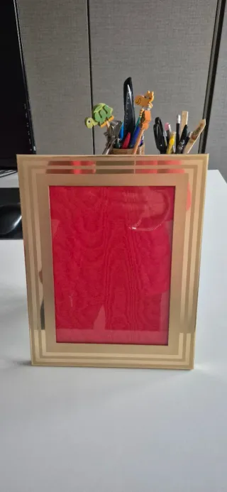 Cornice in metallo dorato dim. interna 12x17