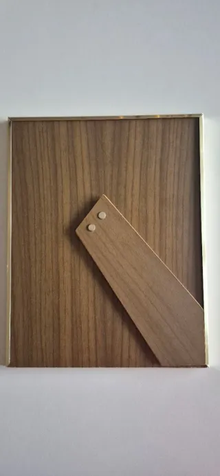 Cornice in metallo dorato dim. interna 12x17