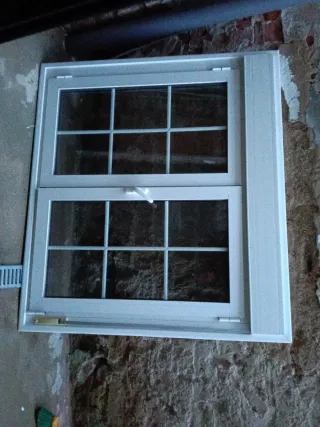 Ventana de aluminio con mosquitera