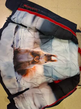 Giubbino blu con cappuccio e pelliccia