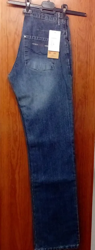 Pantalón vaquero hombre desgastado botones