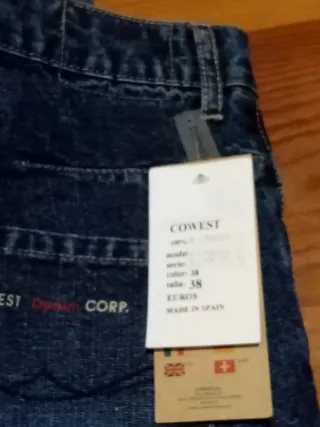 Pantalón vaquero hombre desgastado botones