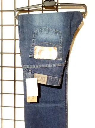 Pantalón vaquero hombre desgastado botones