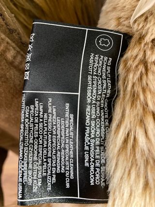 Abrigo piel cerdo marrón con pelo