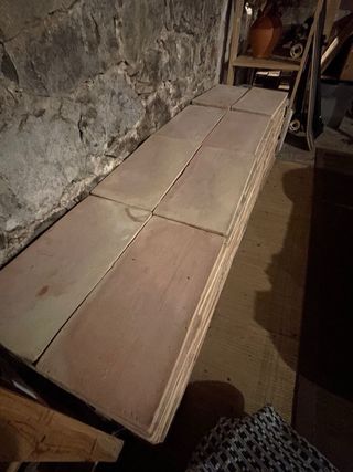 Baldosas de barro cocidas natural