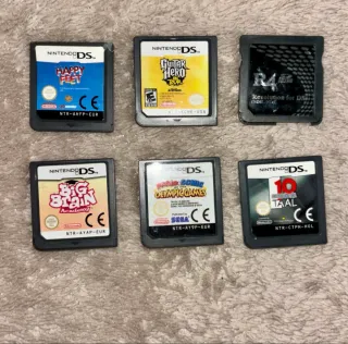 Nintendo DS Lite Rosa + Funda + 10 Juegos + R4