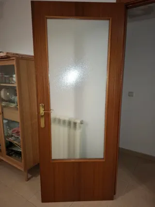 Puerta de sapelli con cristal