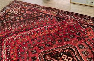 Alfombra persa roja de lana auténtica