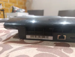 PS3 Super Slim 500GB + 2 Mandos Originales + Pack