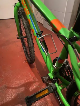 Bicicleta verde con cambios para chico