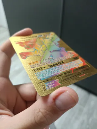 Carta Pokémon Pikachu & Zekrom GX Tag Team Dorada
