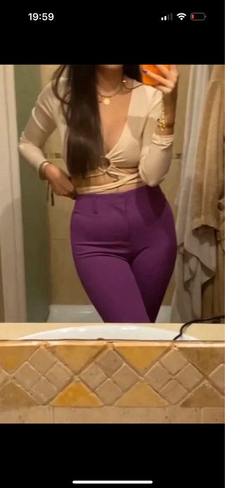 Top manga larga con detalle de anilla