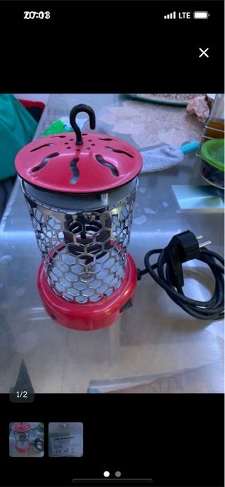 Estufa eléctrica roja y plateada