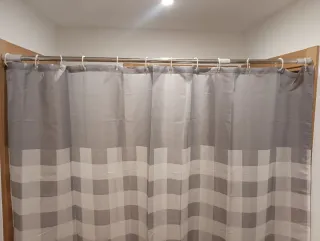 Cortina de ducha con barra telescópica