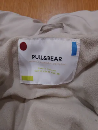 Plumífero anorak corto gris claro