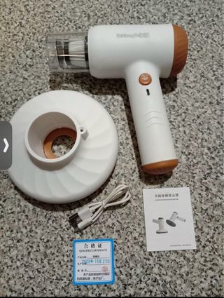 Mini aspirador inalámbrico