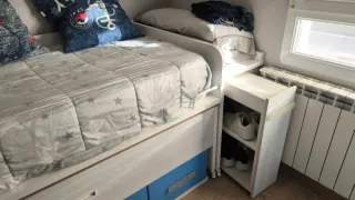 Cama nido doble con mesa y estantería