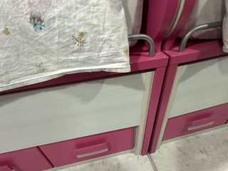 Cama nido con cajones rosa y blanco